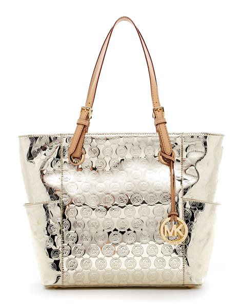 michael kors jet set logo tote gold|Michael Kors jet set girls.